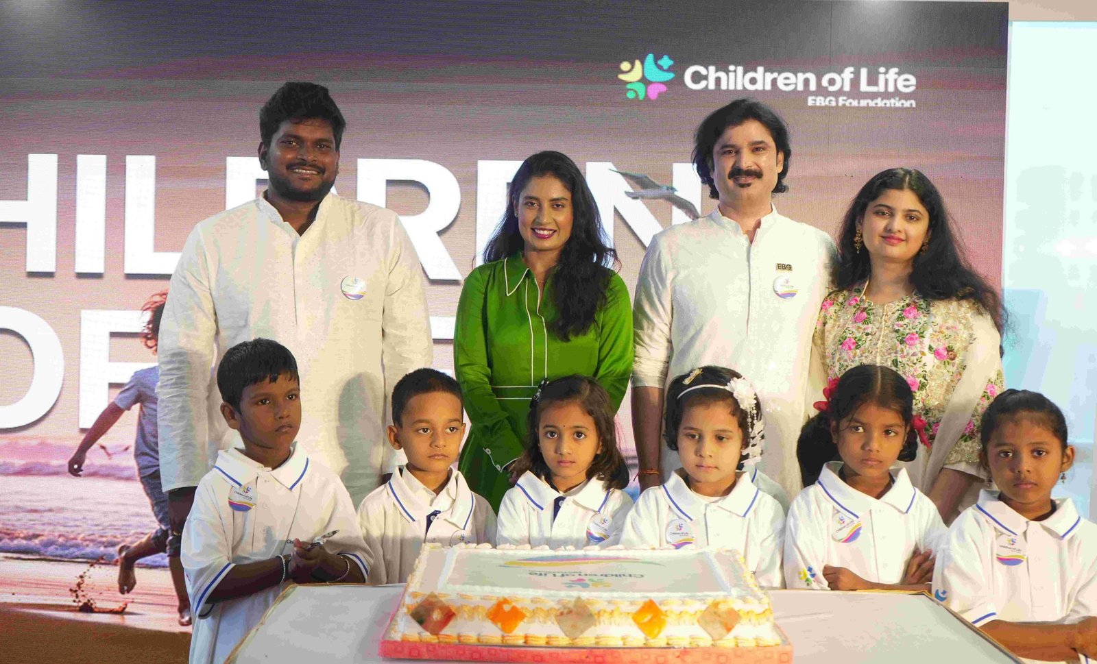 Dr. Irfan Khan, Chairman & Founder of EBG Group, along with Former Indian Women’s Cricket Captain Mithali Raj and Co-founder Hari Kiran, cuts the cake with children on the occasion of Children’s Day as pa